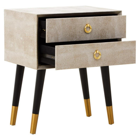 Beige bedside table with gold handles, two open drawers, and black legs with gold tips