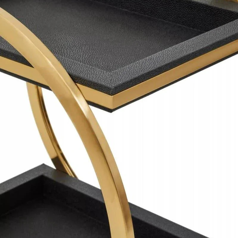 Black and gold metal side table with two rectangular trays and curved handles