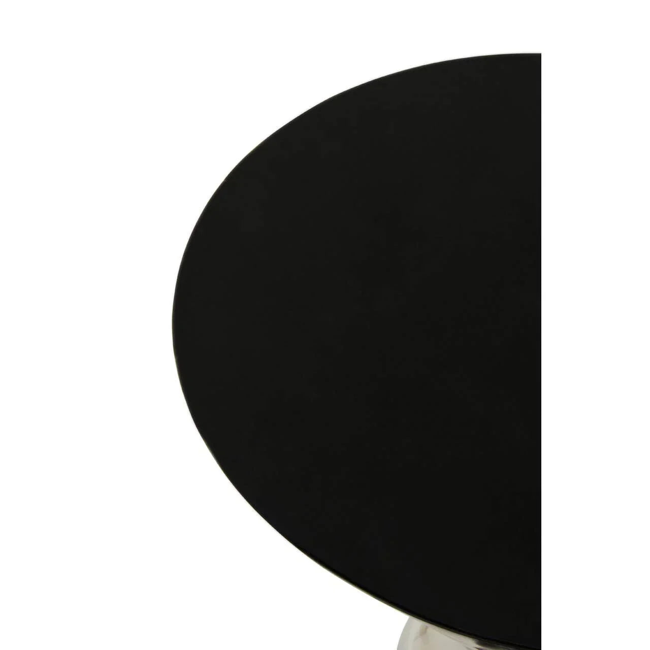 Round black tabletop with chrome base corner close-up