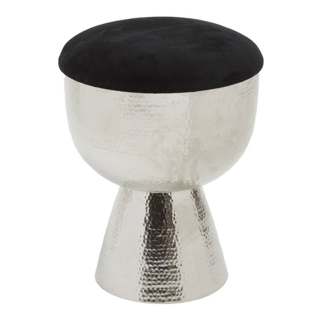A modern stool featuring a sleek, metallic base with a polished finish and a round, black upholstered top. The design combines a tapered shape with a soft cushion, creating a stylish and functional piece for home decor
