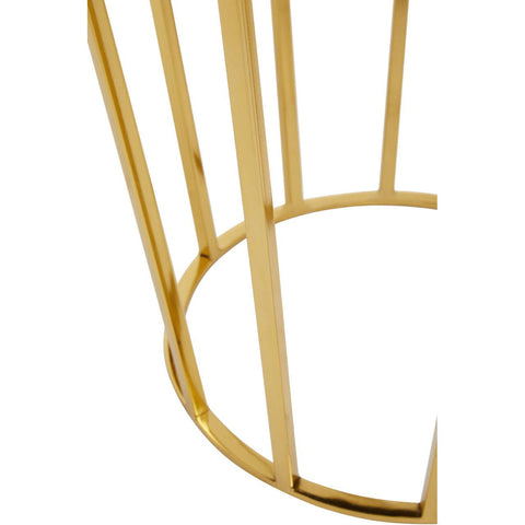 Black velvet stool with a gold finish base featuring vertical metal bars and a circular support structure. The luxurious fabric contrasts with the shiny gold, creating an elegant and modern design