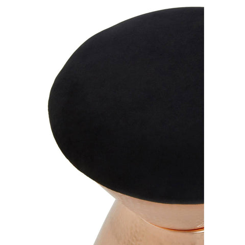 Round black velvet stool with a smooth surface, featuring a copper finish base that adds a modern touch. The stool is partially visible, highlighting its sleek design and elegant materials