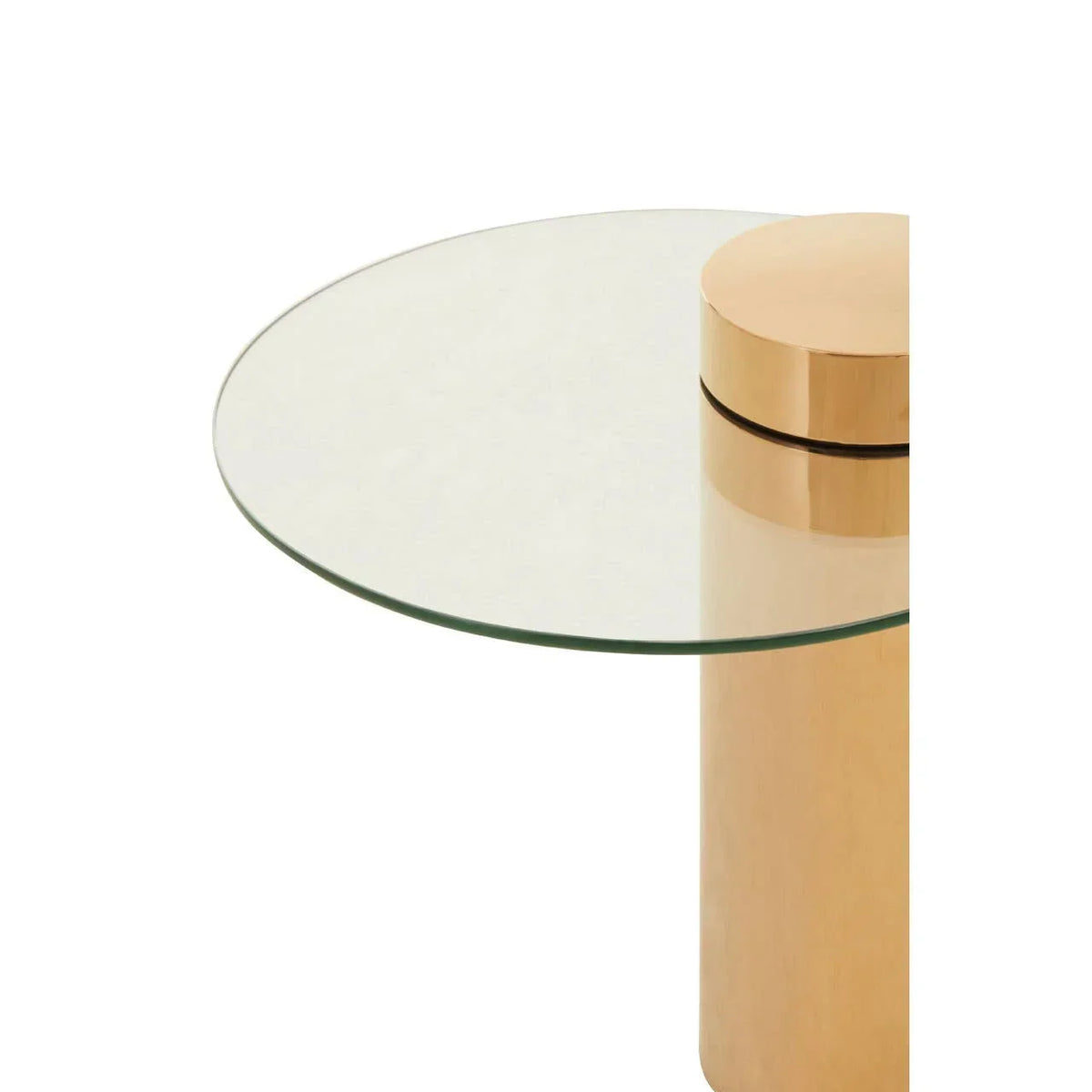 Round glass side table with gold cylindrical base, modern furniture detail view