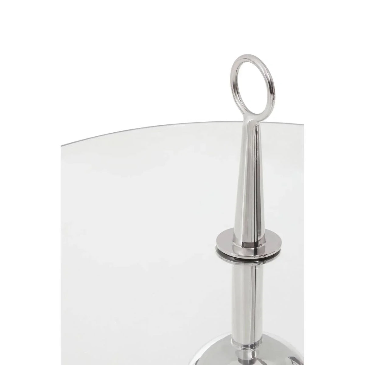 Round glass coffee table with a chrome metal base and loop handle detail