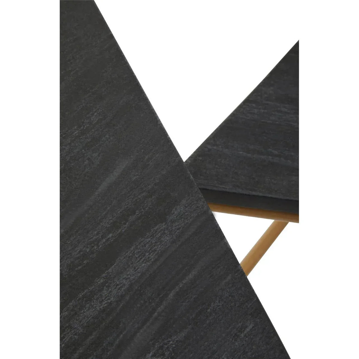 Close view of black dining table top with wood leg support and textured finish