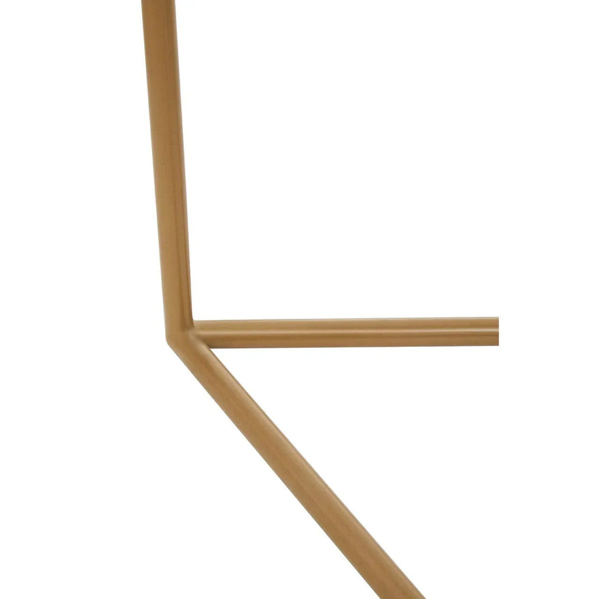 Close-up of gold metal furniture leg with angled support bar on white background