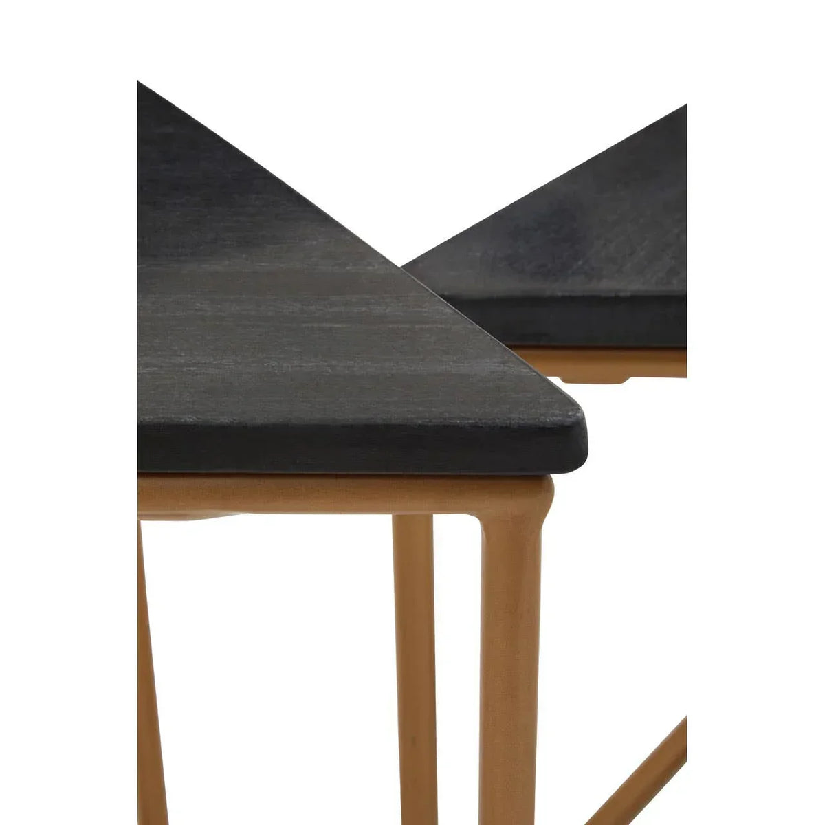 Triangle black tabletop with light wood legs, close-up of modern nesting table set