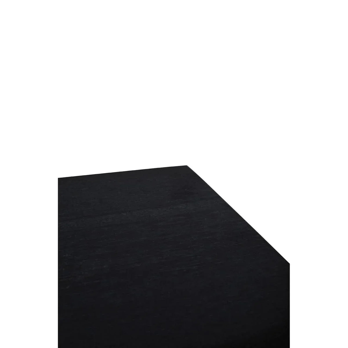 Corner detail of black wooden dining table surface