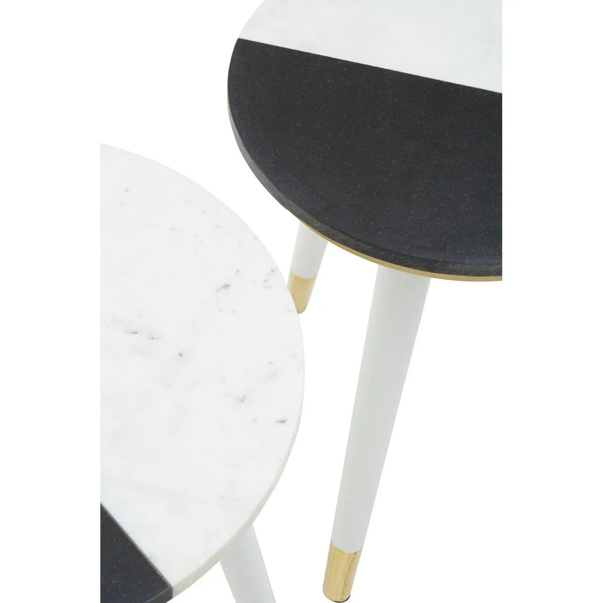 Set of two round marble side tables with black and white tops and gold leg accents