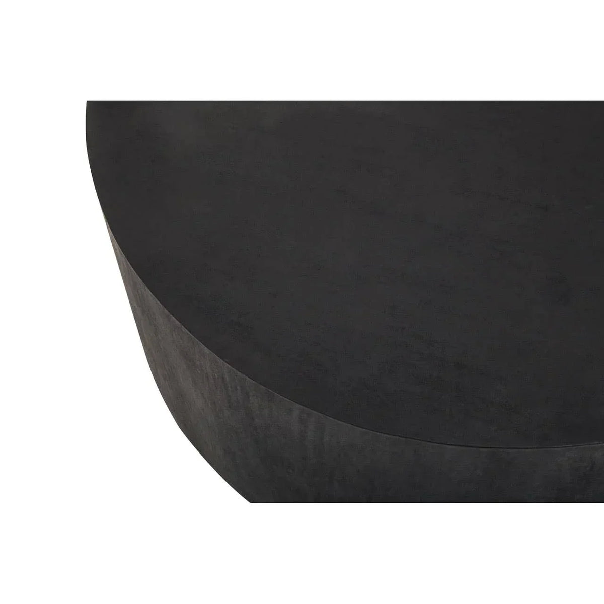 Closeup of black round coffee table with smooth matte surface
