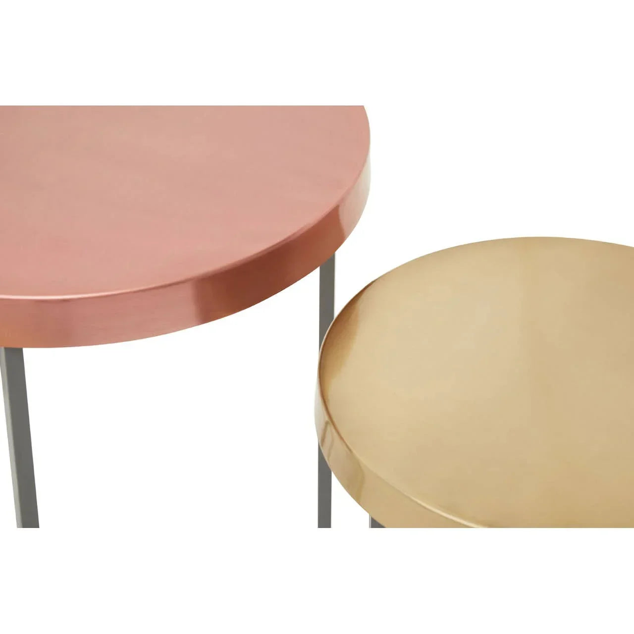Round nesting tables with metal frames, one copper finish and one gold finish tabletop
