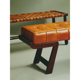 Tan leather bench with tufted cushion and dark wood frame, side angle view
