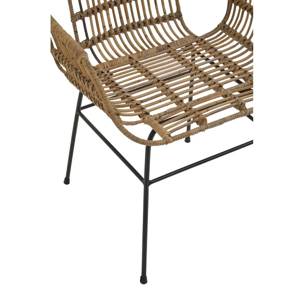Closeup of rattan dining chair seat with black metal legs