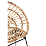 Natural rattan chair with a sunflower-inspired design, featuring a curved backrest and a black metal frame, showcasing intricate weaving and a spacious seat