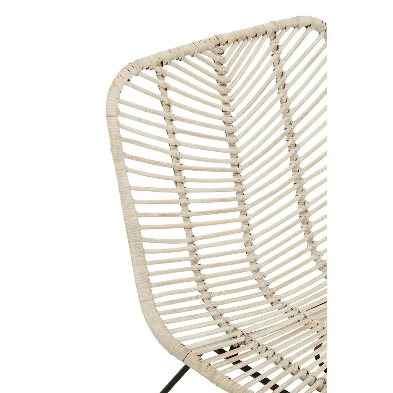 Close up of natural rattan chair seat and back with light woven detailing