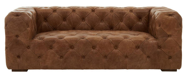 Three-seat sofa upholstered in rich brown leather with a modern Chesterfield design, featuring deep button tufting and wide, square arms. The sofa rests on short wooden legs, showcasing a sleek and contemporary silhouette