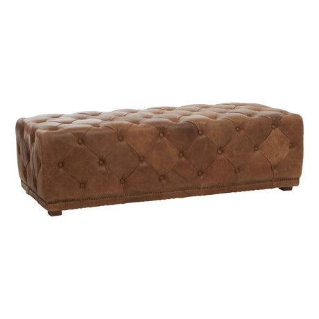 Brown leather rectangle ottoman featuring a tufted design and rounded edges, resting on four small wooden legs. The surface has a rich, textured appearance, showcasing the quality of the leather