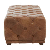 Brown leather rectangle ottoman featuring a tufted top with button detailing and a sturdy base. The ottoman has a smooth finish and rounded edges, suitable for use as a footrest or additional seating