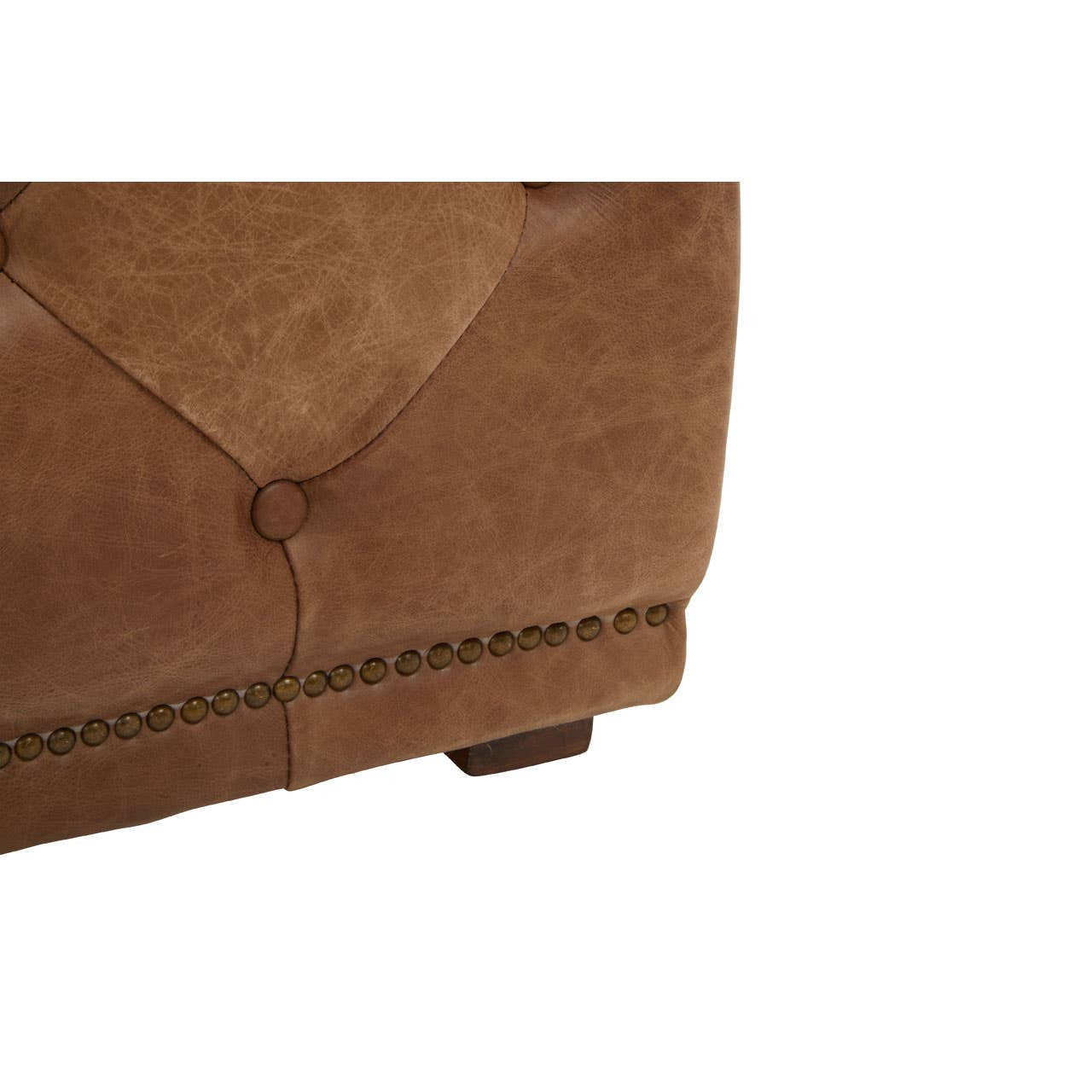 Brown leather rectangle Chesterfield ottoman featuring a tufted design and decorative stitching along the edges, resting on short wooden legs