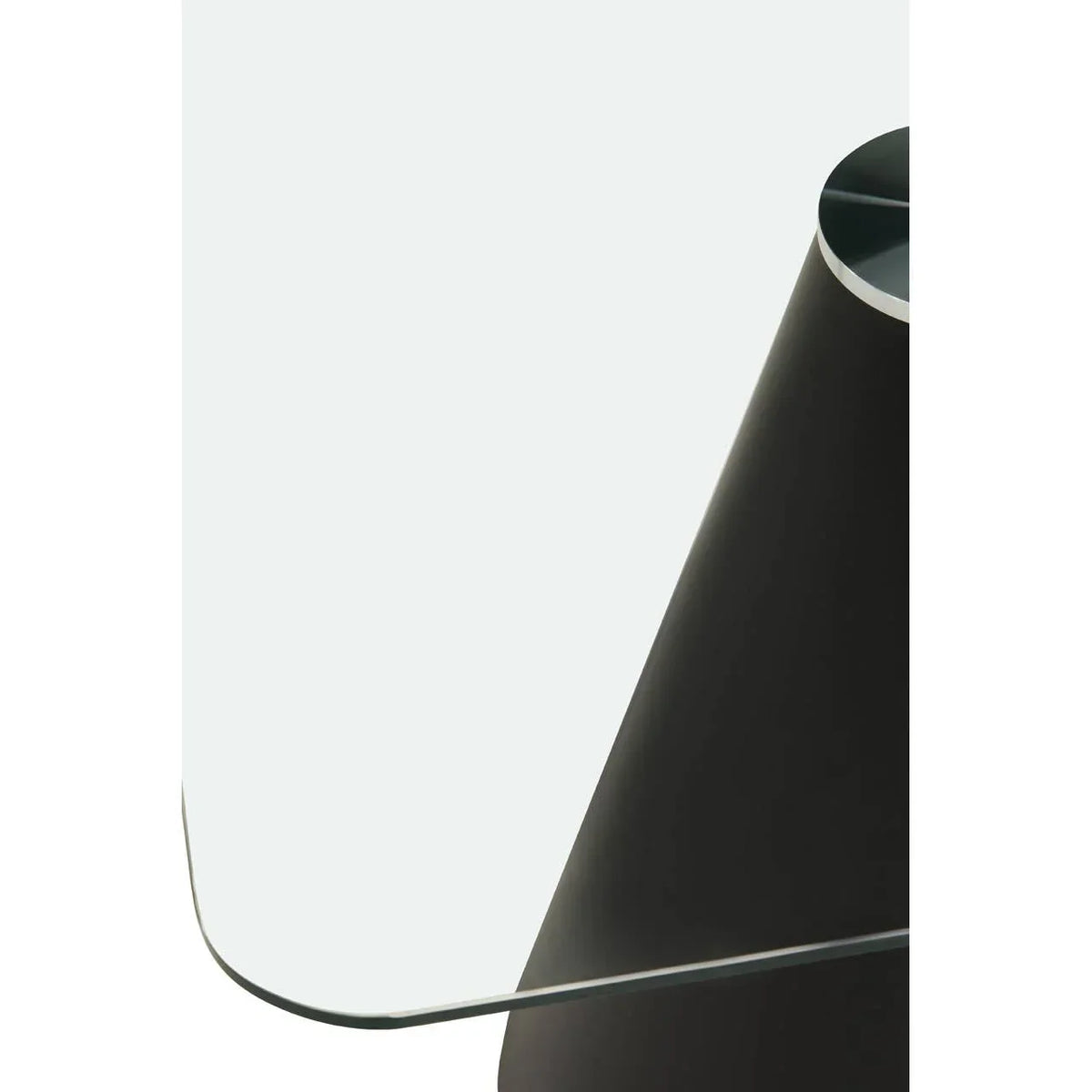 Glass top dining table corner with black conical base detail