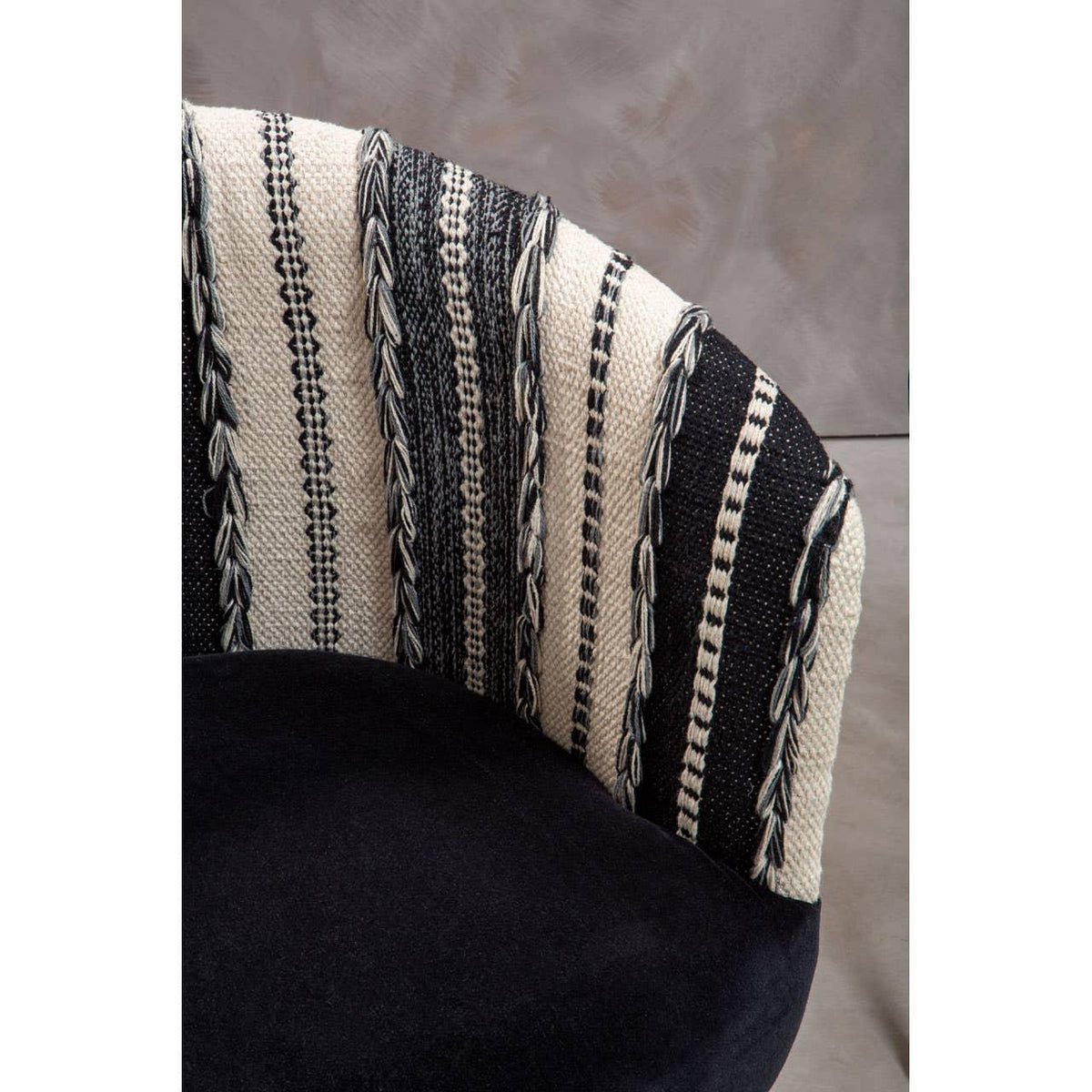 Black and cream woven fabric accent chair with curved backrest and striped pattern detail