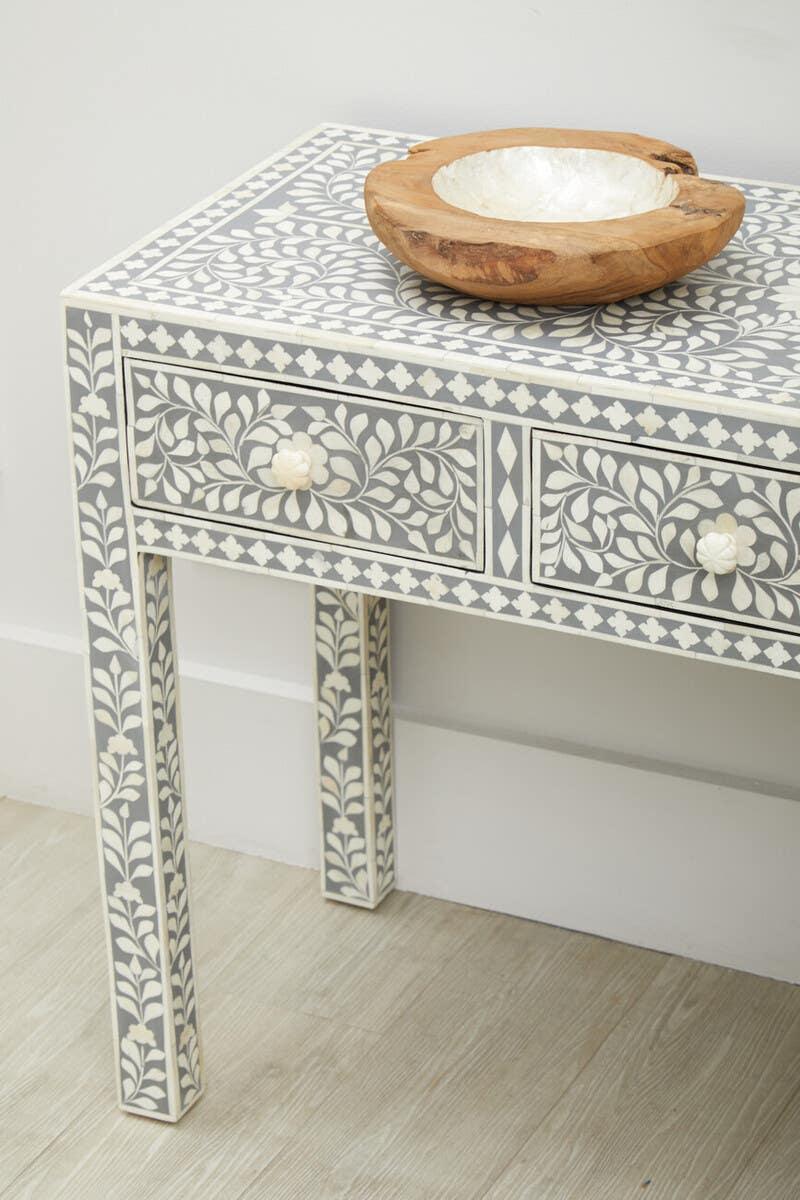 Bone inlay console table with floral pattern and two drawers, wooden bowl on top