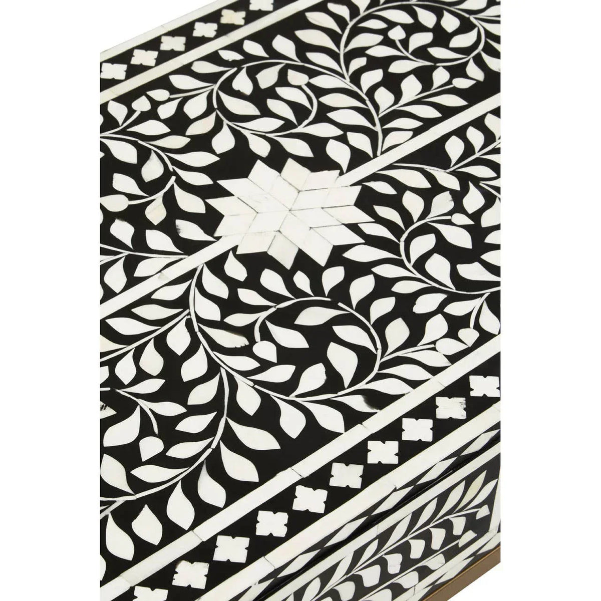Black and white bone inlay table top with floral and geometric pattern detail