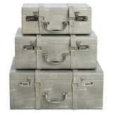 Set of three grey storage trunks with silver handles and combination locks, stacked front view