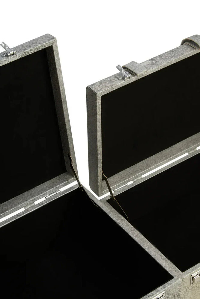 Open grey storage trunk set with textured finish showing interior compartments