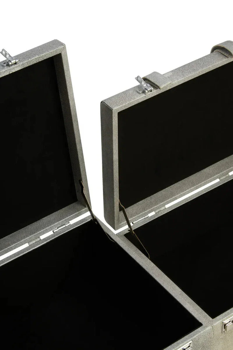Open grey storage trunk set with textured finish showing interior compartments