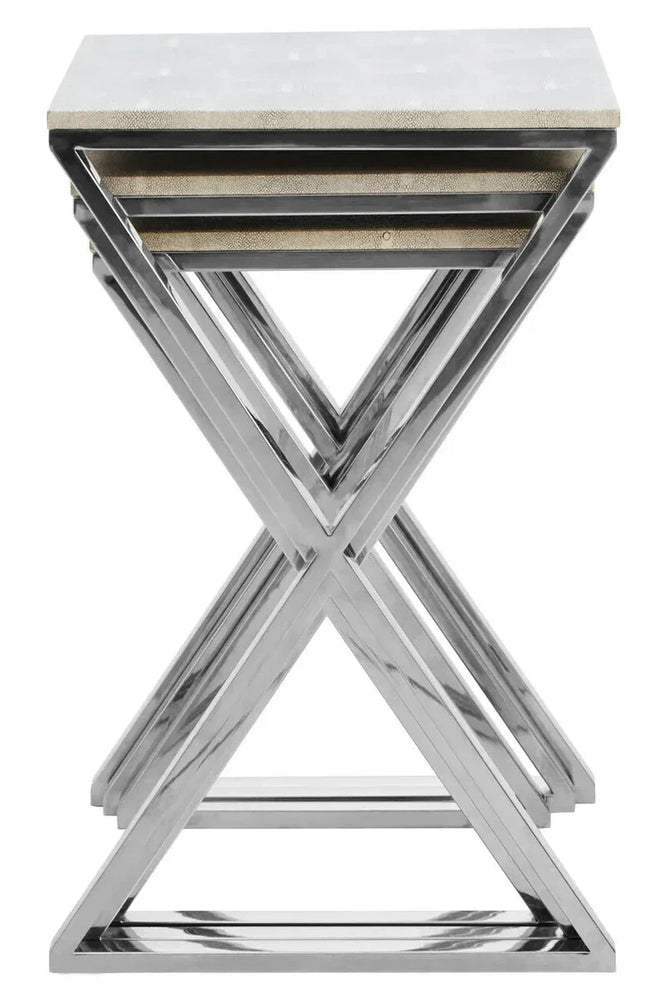 Set of three nesting tables with chrome frames and stone effect tops in a stacked arrangement
