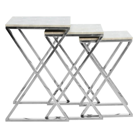 Set of three nesting tables with chrome metal frames and white tabletops, side view