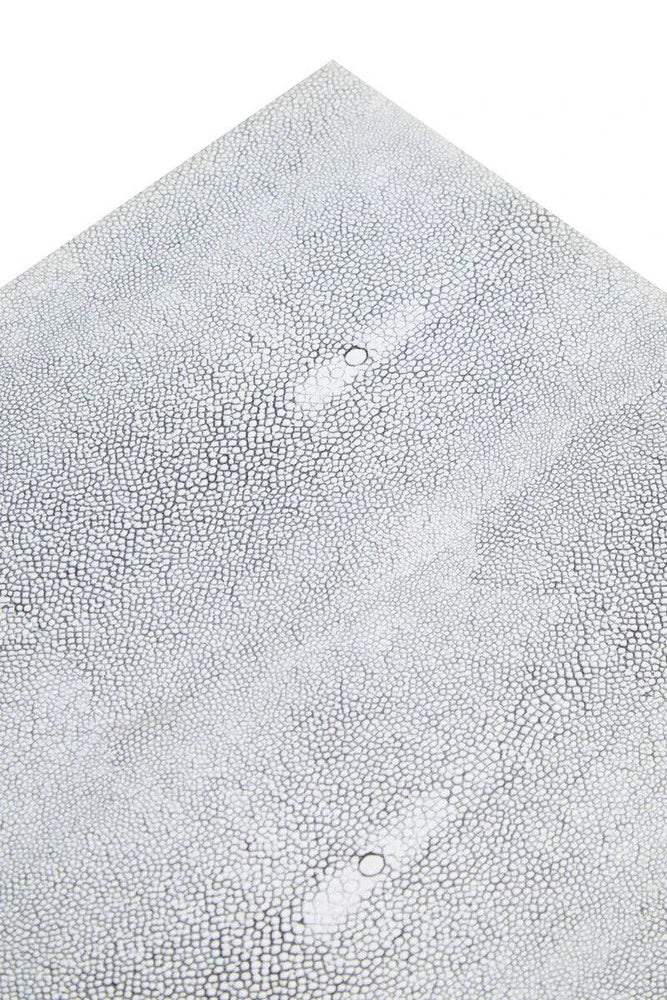 Close up of white faux shagreen furniture surface with textured detail
