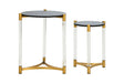 Set of two round side tables with black tops, clear legs, and gold metal accents