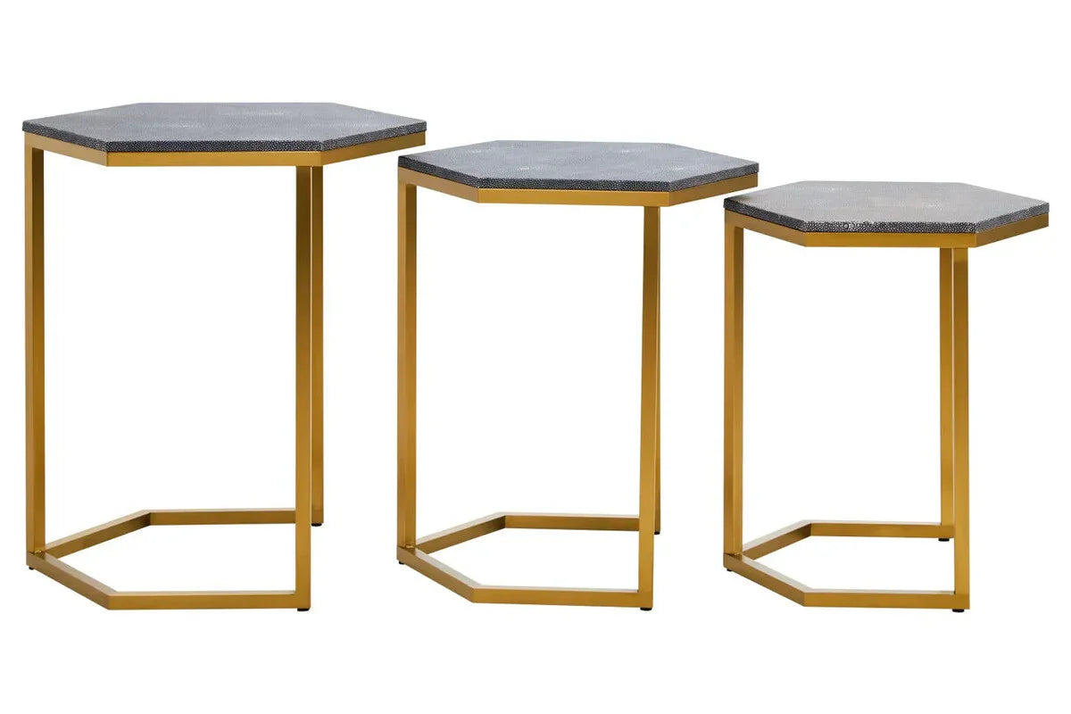 Set of three hexagonal side tables with gold metal frames and dark textured tops