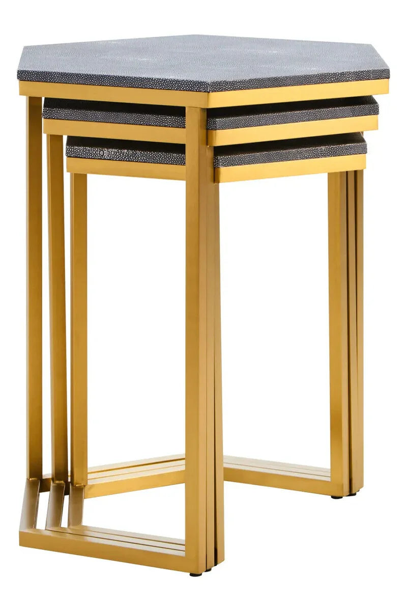 Set of three hexagonal nesting tables with gold metal frames and textured grey tops