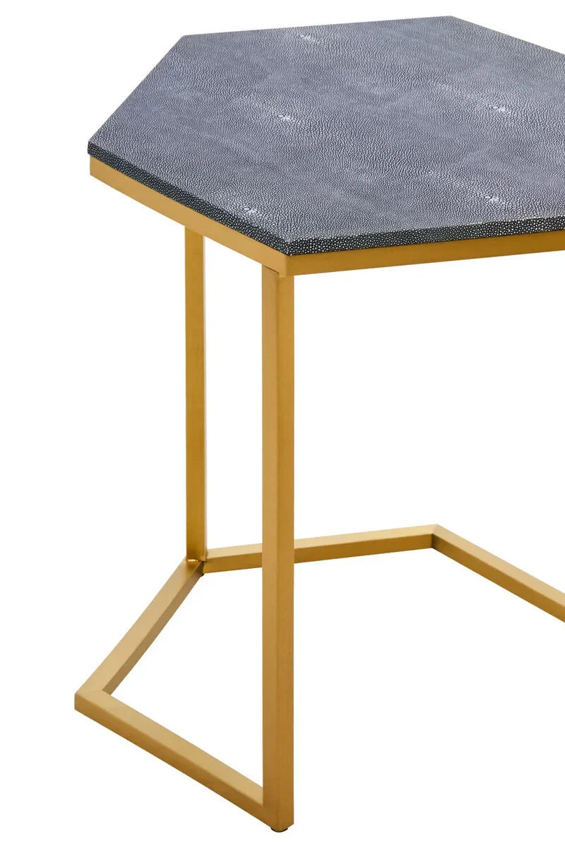 Hexagonal side table with textured black tabletop and gold metal frame