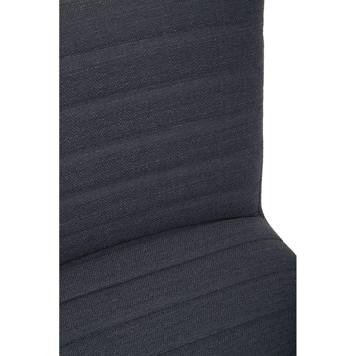 Close up of dark grey fabric dining chair with horizontal stitched detail