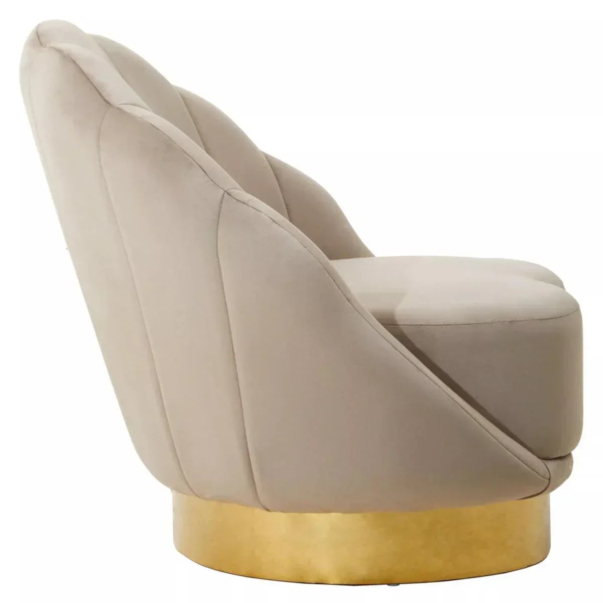 Beige velvet accent chair with scalloped back and gold metal base, side profile view
