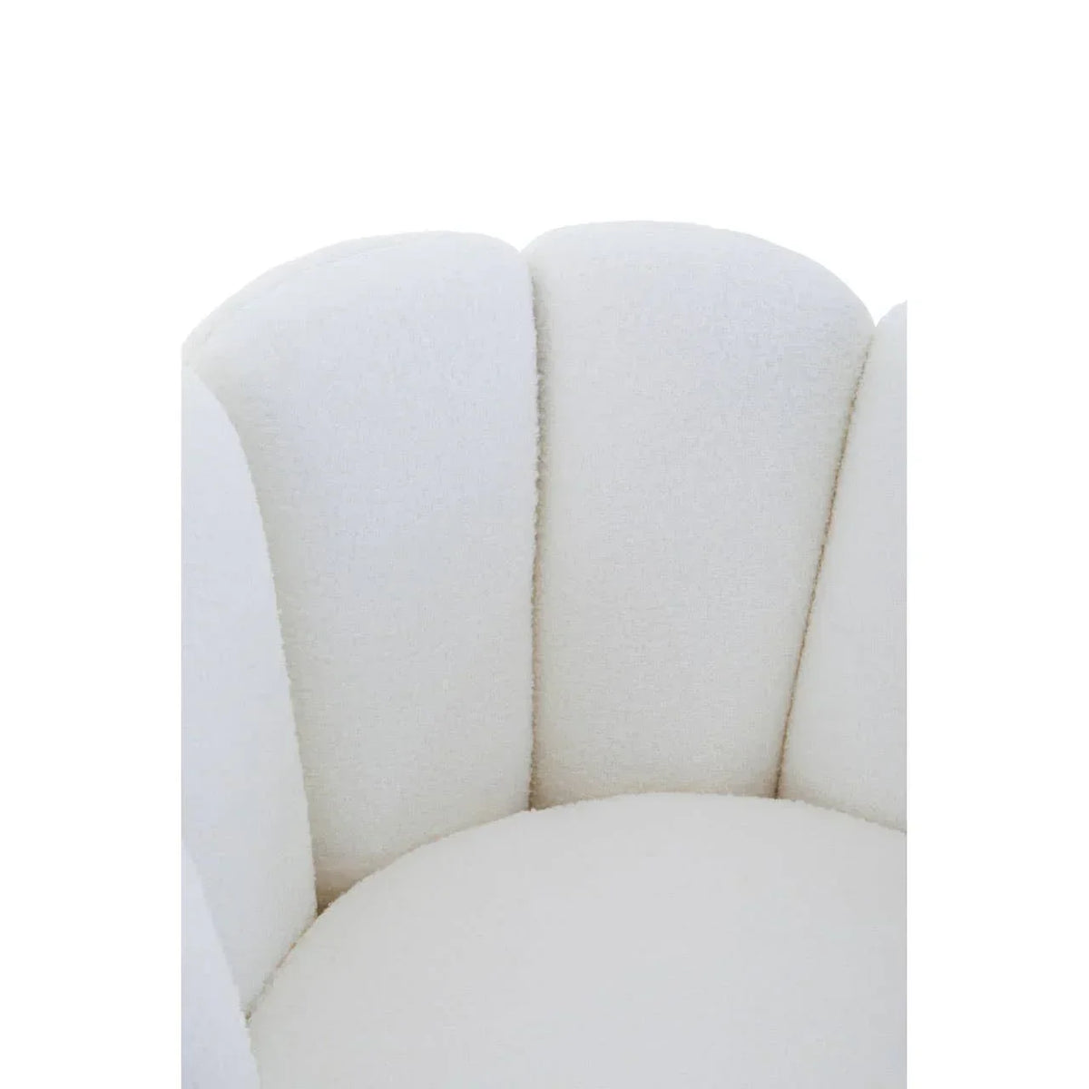 Close-up of scallop back cream velvet accent chair upholstery