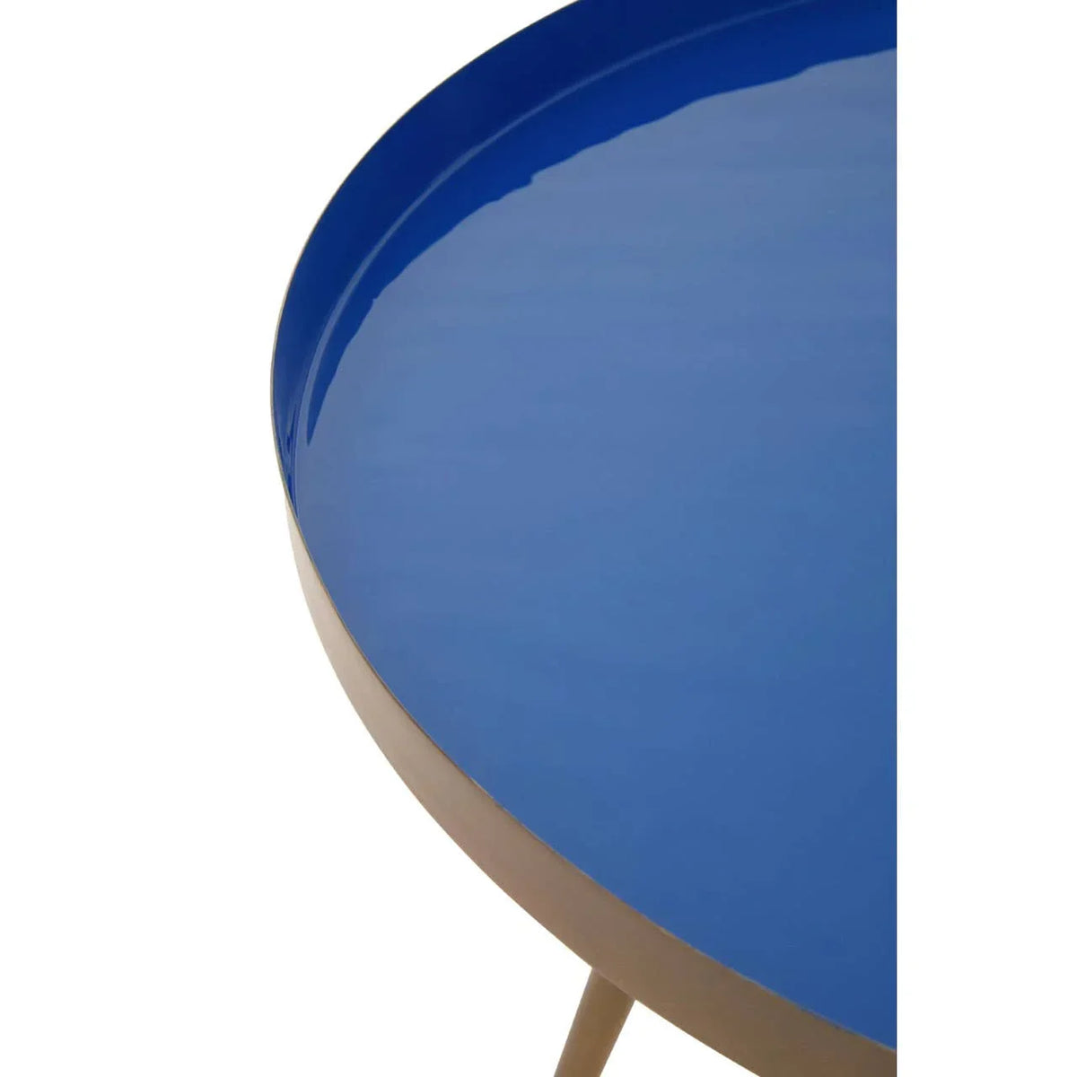 Round side table with blue metal top and slim legs, close-up angle