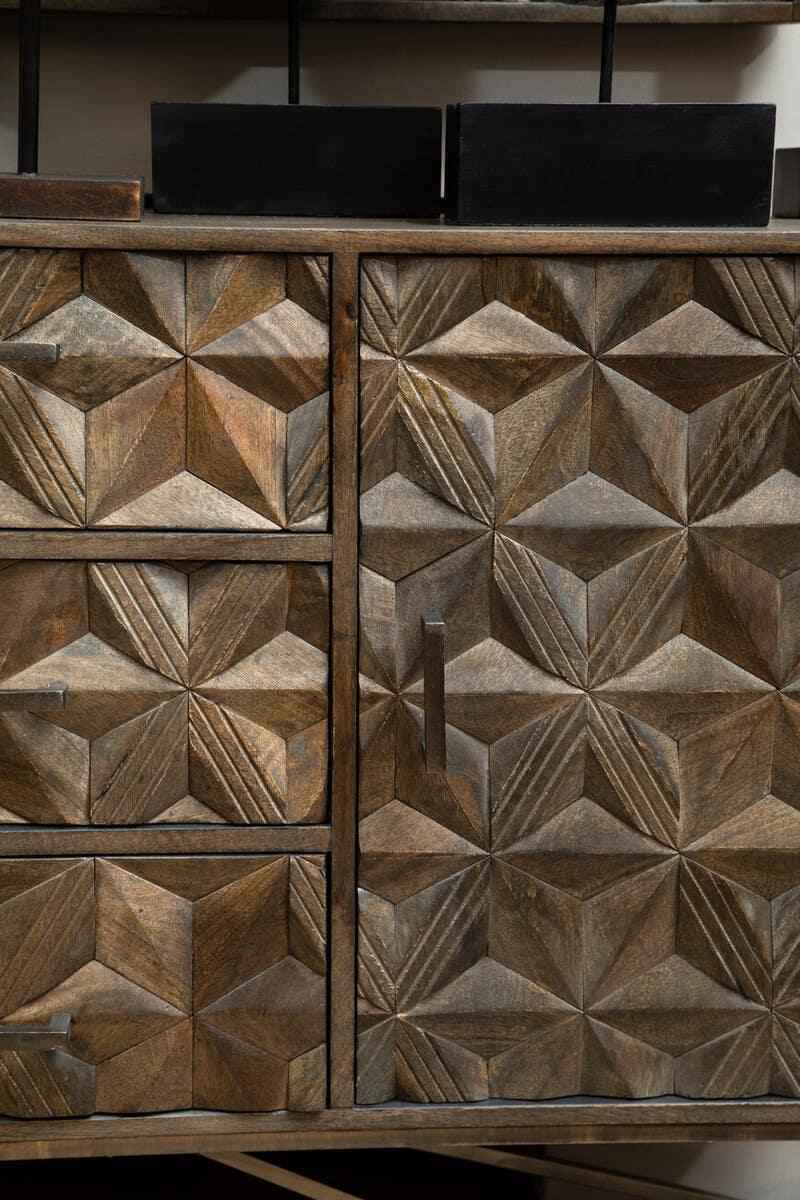 Carved wood sideboard with geometric patterns, featuring drawers and a cabinet door