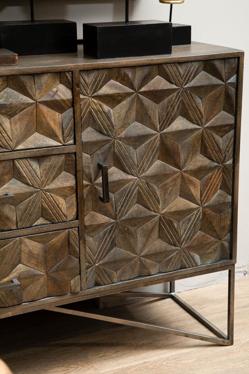 Geometric carved wood sideboard with metal handles and legs on wooden floor