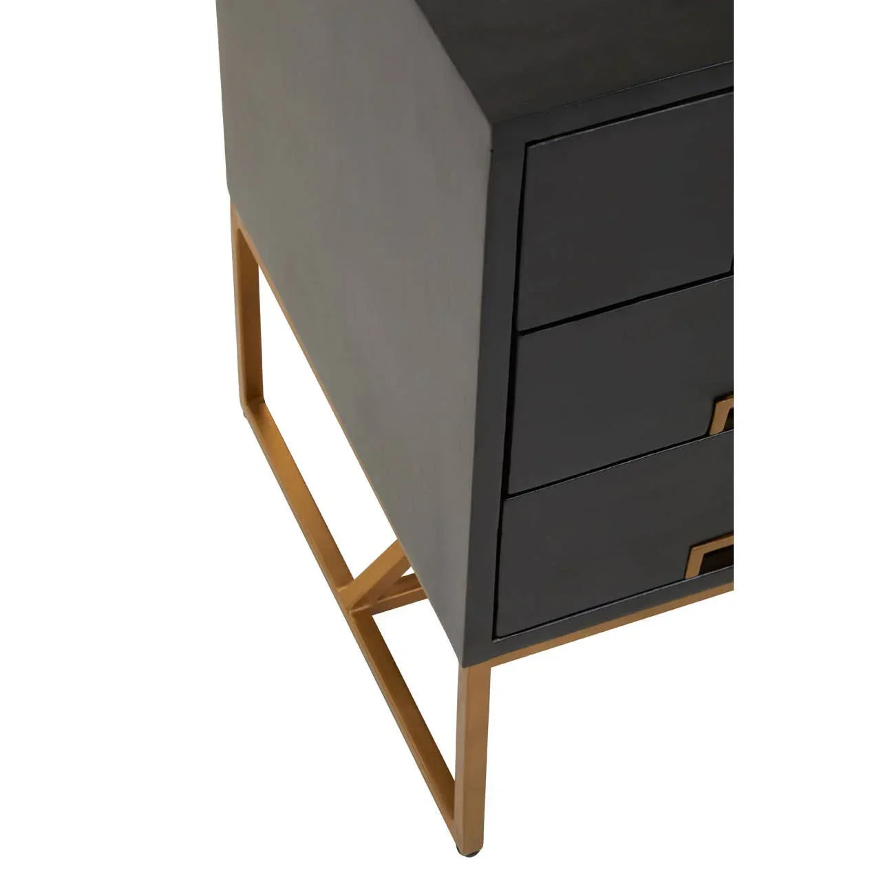 Close-up of black drawer cabinet with gold metal legs and handles