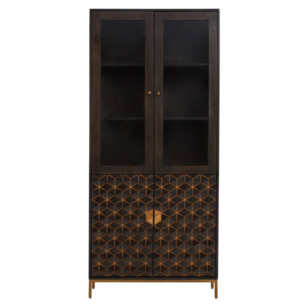 Tall cabinet made of mango wood with a grey finish, featuring two glass-paneled doors at the top and a decorative patterned lower section. The cabinet has a sleek design with a gold-toned handle and stands on slender legs. The interior includes two shelves for storage