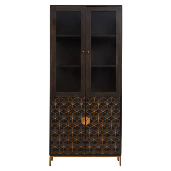 Tall cabinet made of mango wood with a grey finish, featuring two glass-paneled doors at the top and a decorative patterned lower section. The cabinet has a sleek design with a gold-toned handle and stands on slender legs. The interior includes two shelves for storage