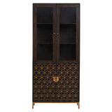 Tall cabinet made of mango wood with a grey finish, featuring two glass-paneled doors at the top and a decorative patterned lower section. The cabinet has a sleek design with a gold-toned handle and stands on slender legs. The interior includes two shelves for storage