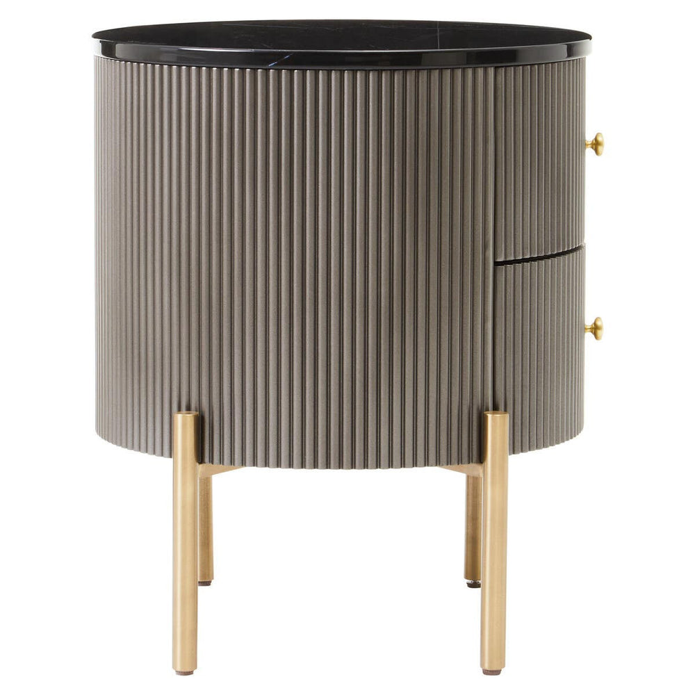 Grey two-drawer chest featuring a sleek black marble top, round body with vertical grooves, and gold legs. The chest has two drawers with minimalist gold handles, adding a modern touch to home decor