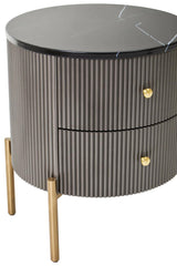 Grey two-drawer chest featuring a sleek black marble top, round shape, and gold knobs. The chest is supported by four wooden legs, adding a modern touch to the design