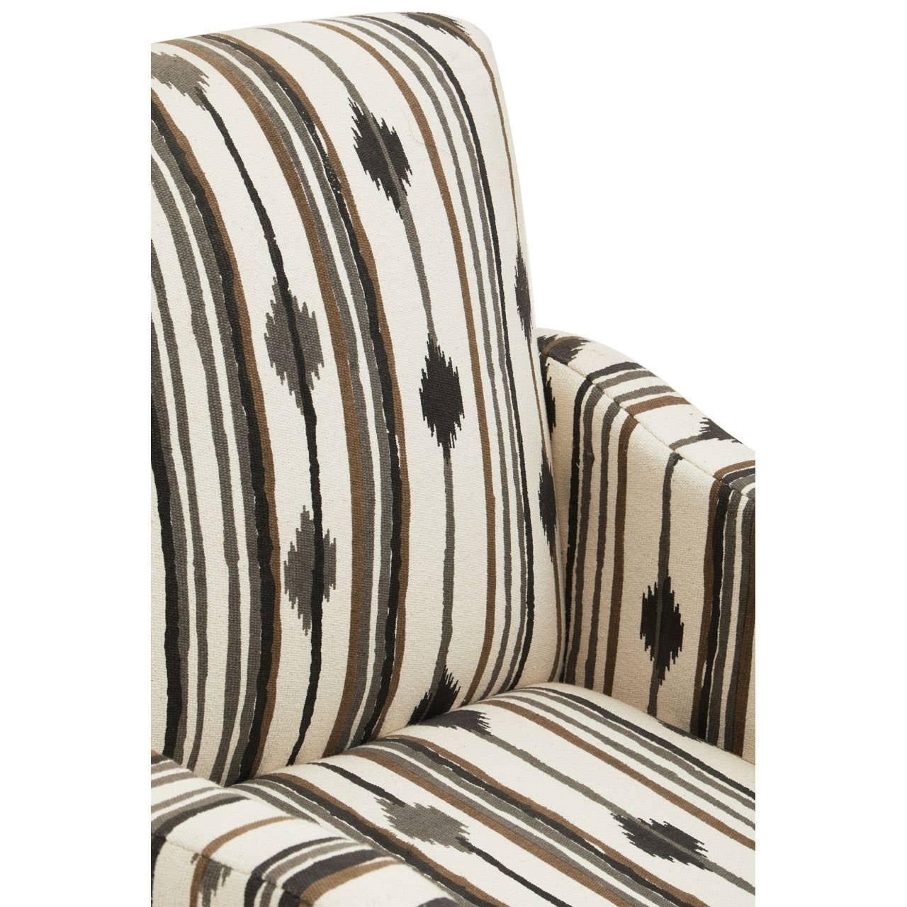 Striped armchair with geometric pattern in beige, brown and black upholstery, close-up view